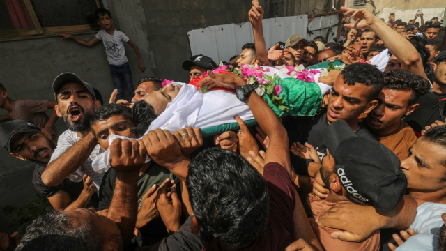 Strikes kill 94 Palestinians in Gaza, including 45 people waiting for aid, authorities say